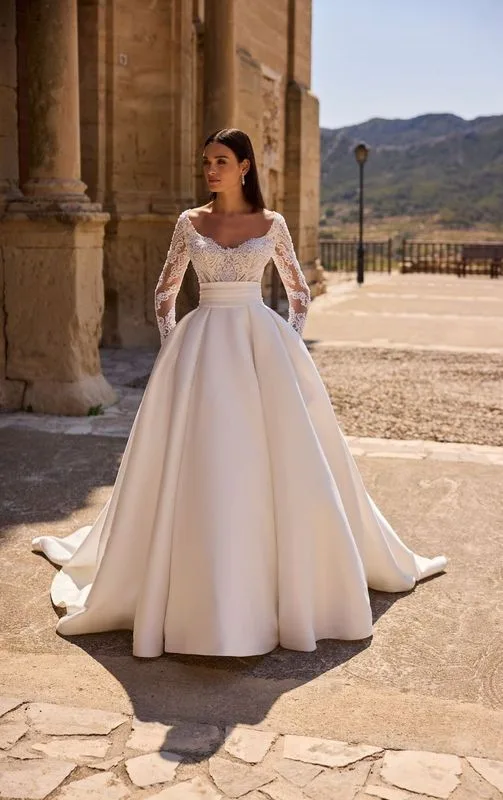 Long sleeved ballgown wedding dress