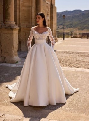 Long sleeved ballgown wedding dress